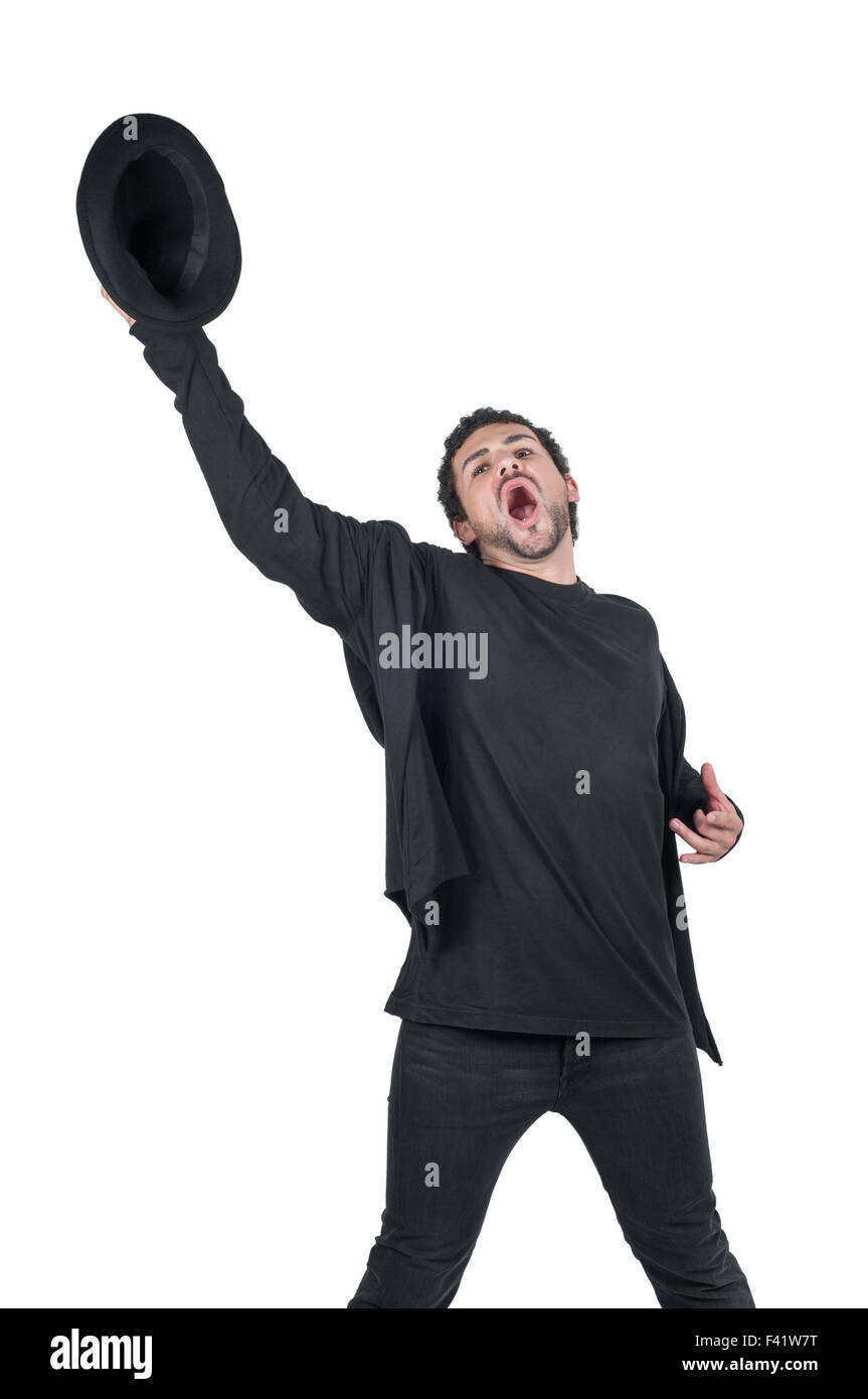 Young man with hat in hand yelling Stock Photo