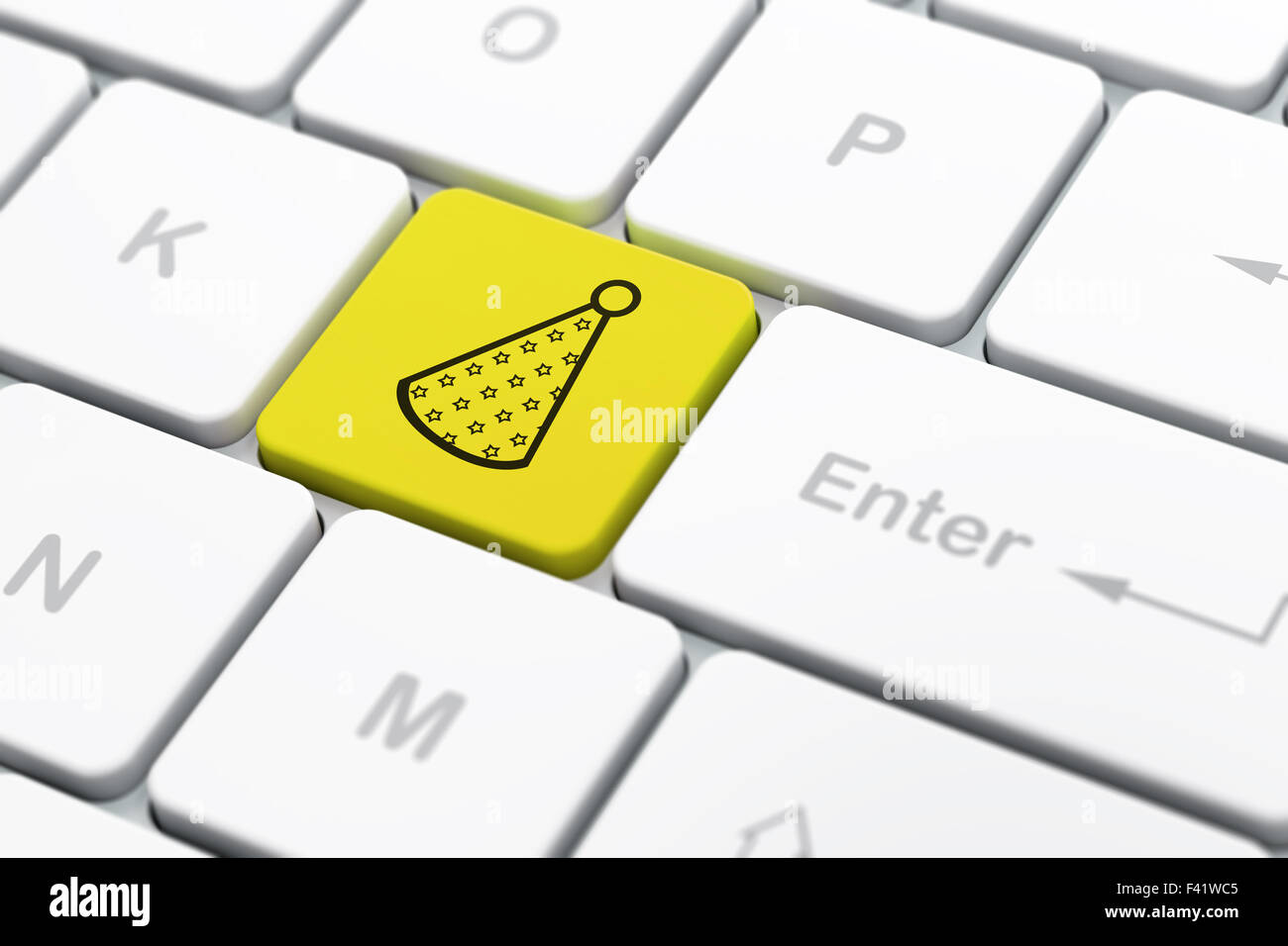 Entertainment, concept: Party Hat on computer keyboard background Stock Photo