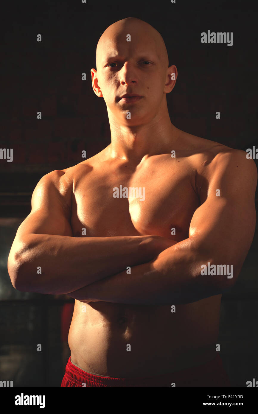 boxer with arms crossed Stock Photo Alamy