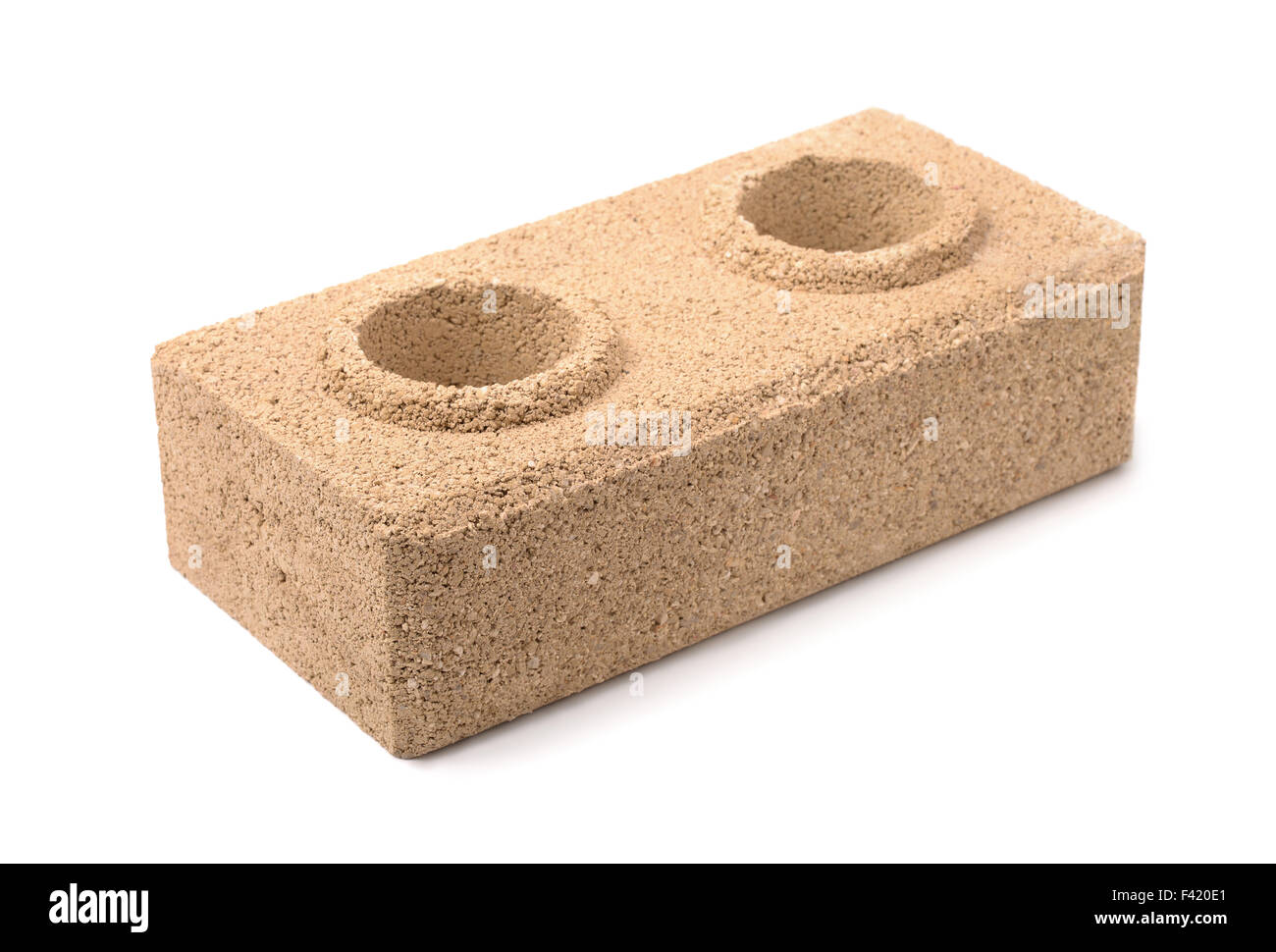 Dry pressed brick isolated on white Stock Photo