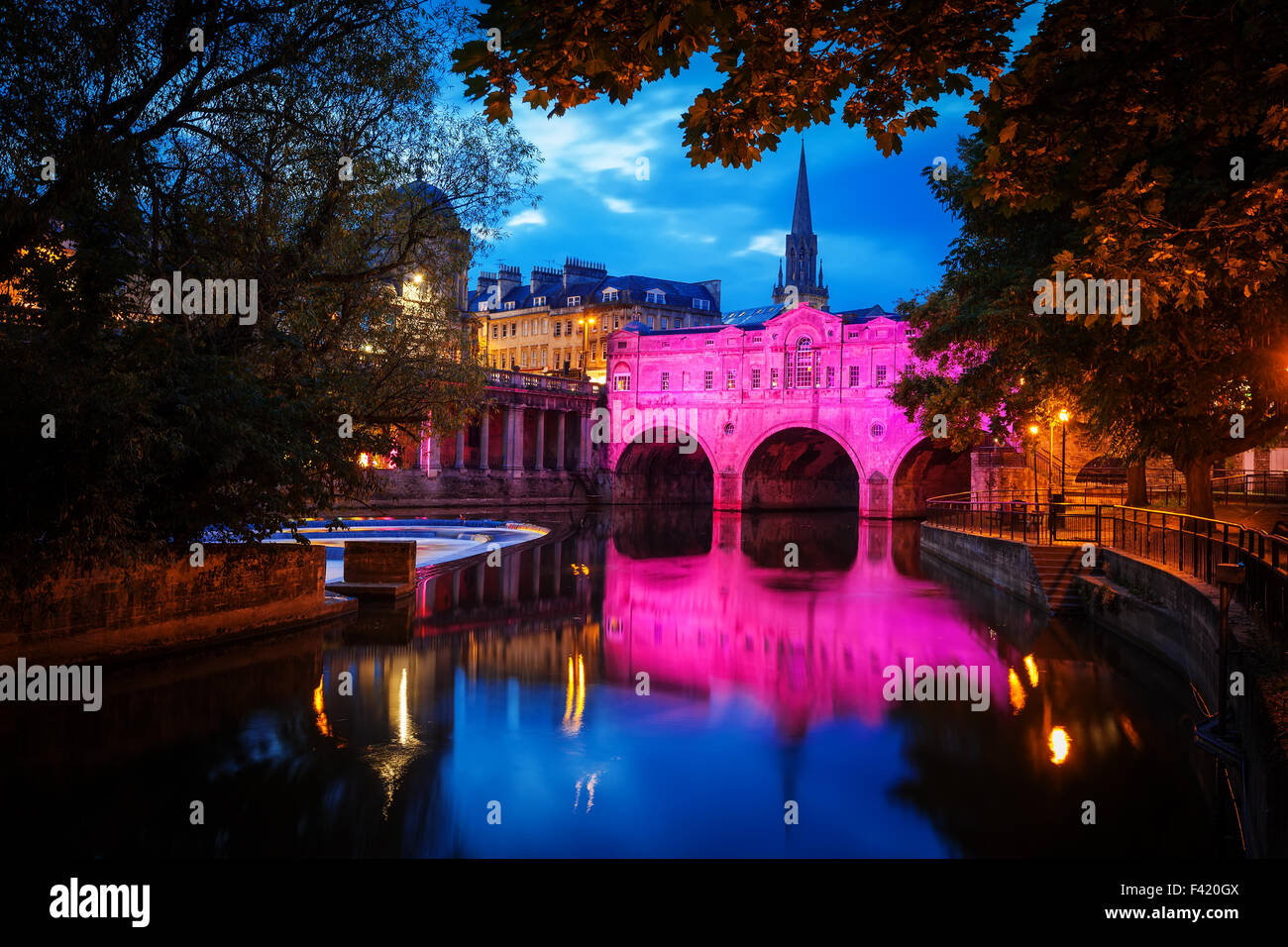 Pulteney Bridge in Bath at night with colourful lighting Stock Photo