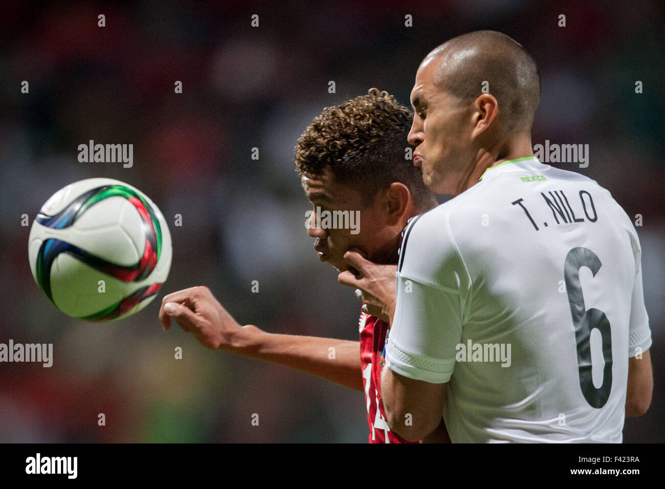 Toluca, Mexico. 13th Oct, 2015. Jorge Torres Nilo (R) of Mexico vies for the ball with Valentin Pimentel of Panama during an international friendly match held at Nemesio Diez Stadium, in Toluca City, capital of the State of Mexico, Mexico, on Oct. 13, 2015. Mexico won 1-0. Credit:  Pedro Mera/Xinhua/Alamy Live News Stock Photo