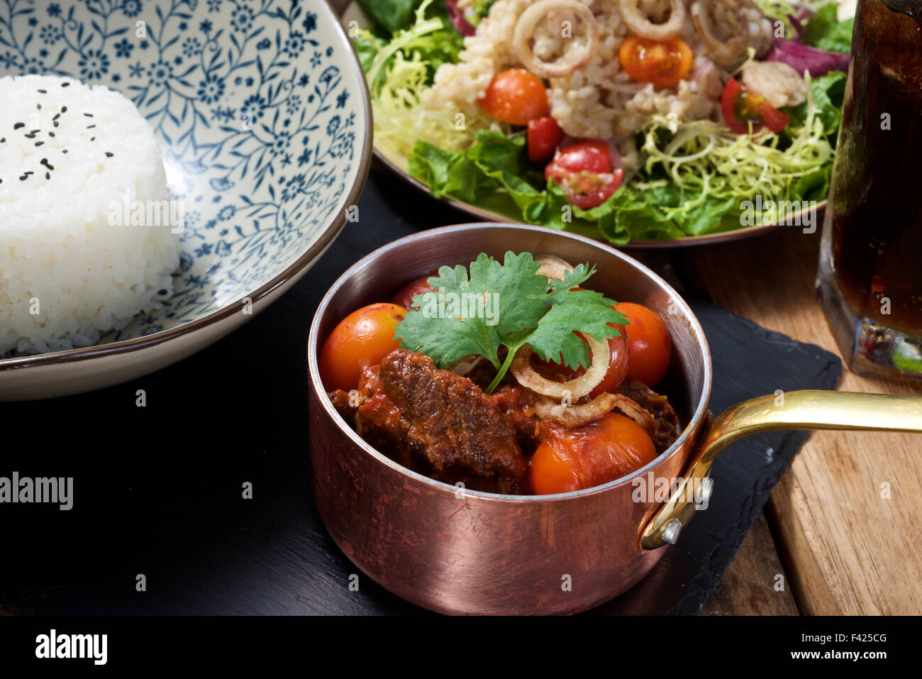 Delicious Beef stew set dish on wooden table Stock Photo