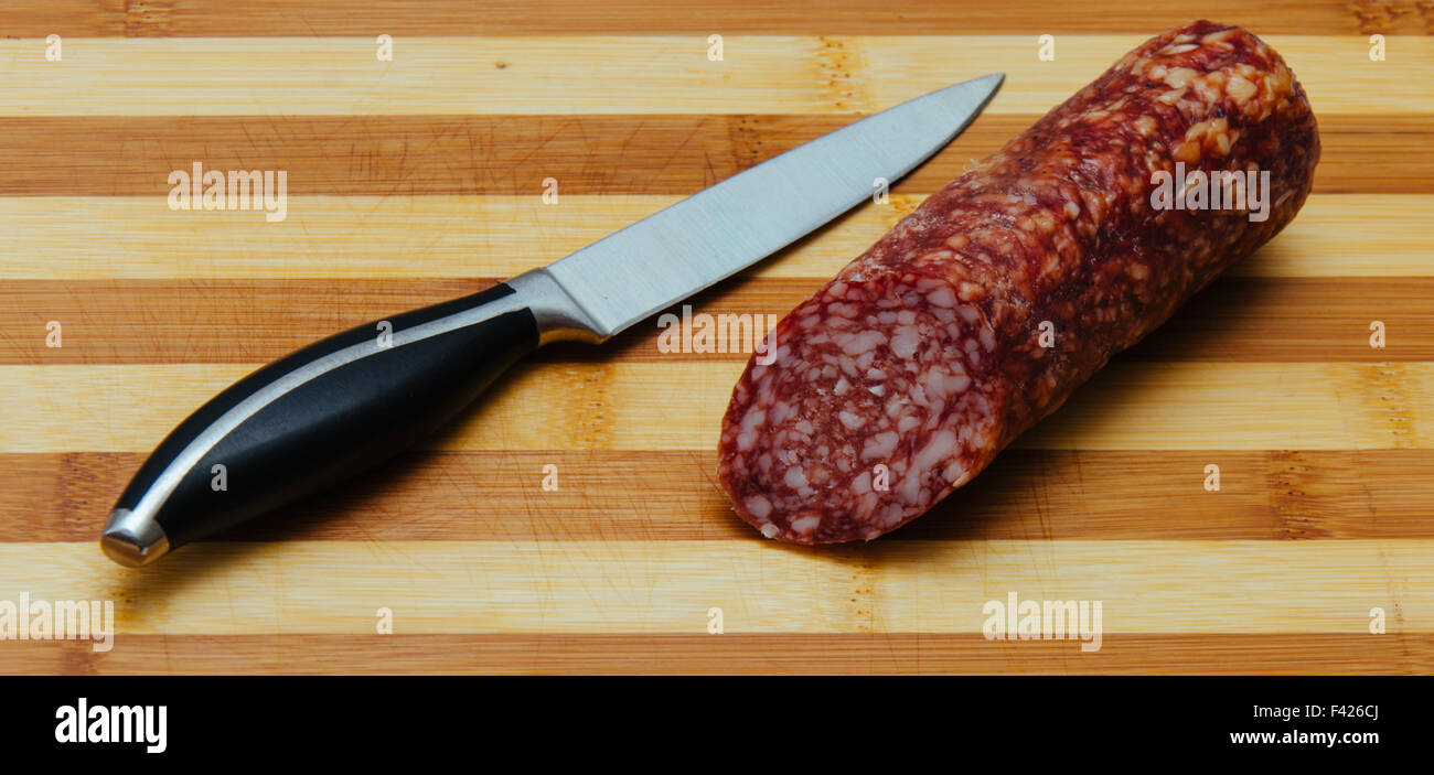 Knife and Sausage Stock Photo