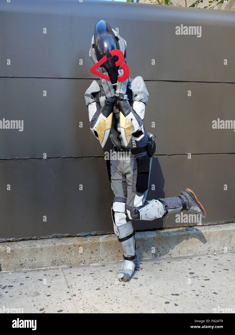 An attendee of New York Comic Con 2015 dresses as Zero the Assassin from the video game Borderlands 2. Stock Photo