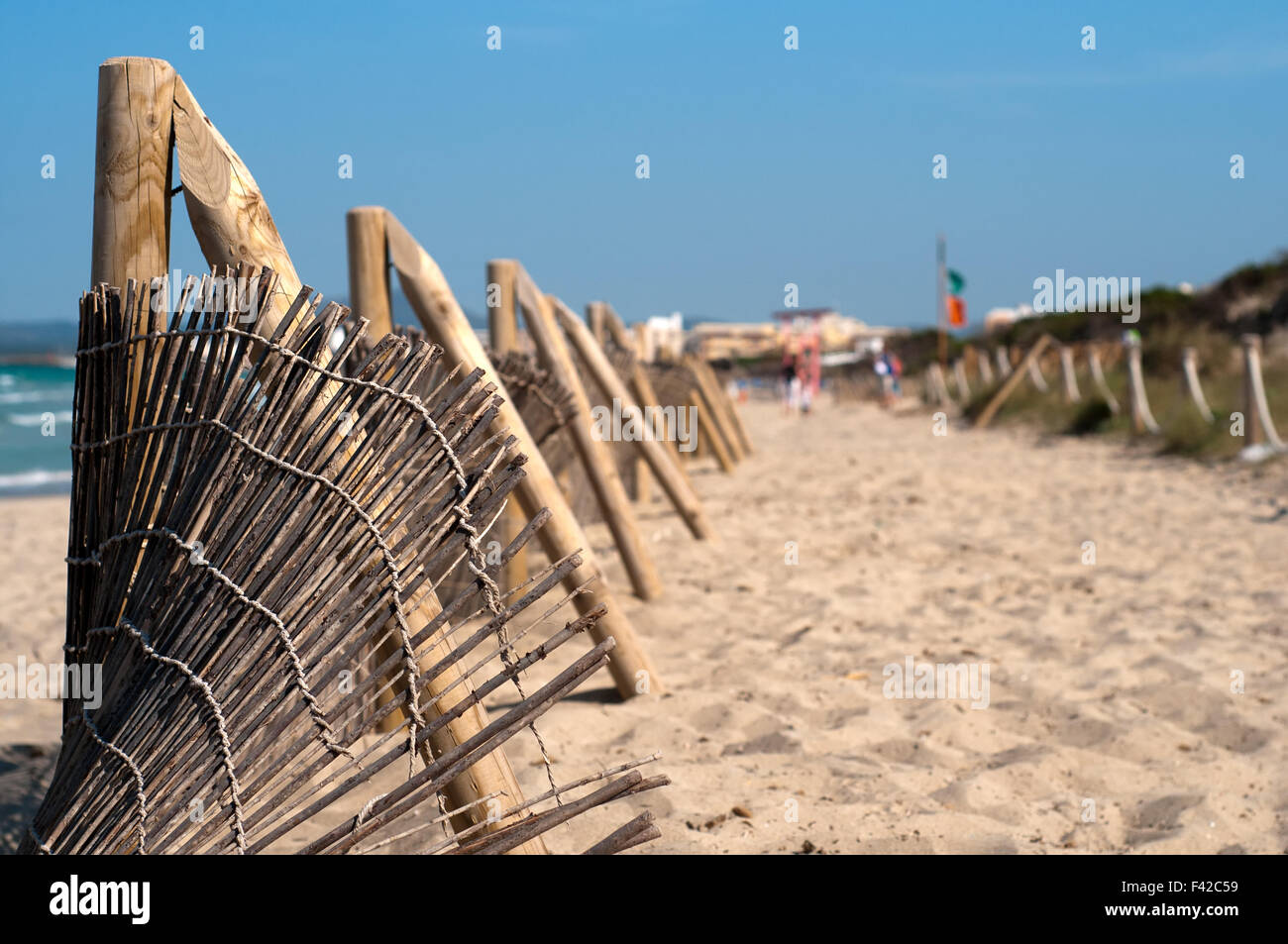Fence on the beach Stock Photo - Alamy