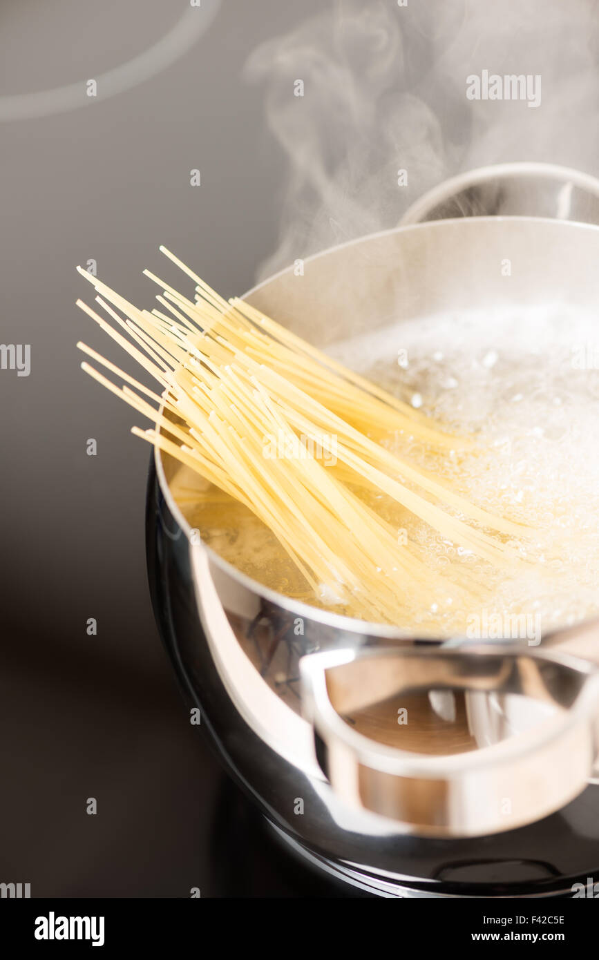 Pan with spaghetti close up Stock Photo