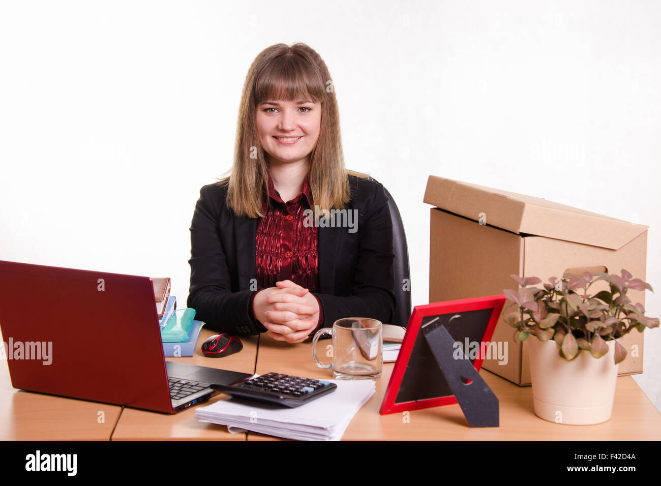 Business woman sitting at office table Stock Photo