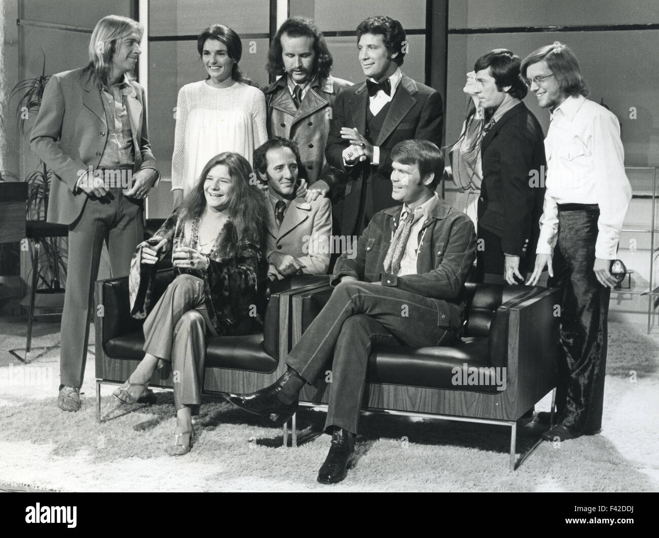 TOM JONES Welsh singer on his TV show 'This is Tom Jones' in April 1969. Jones in bow tie. Glen Campbell seated at right and Janis Joplin at left. Others are members of American comedy group The Committee. Stock Photo