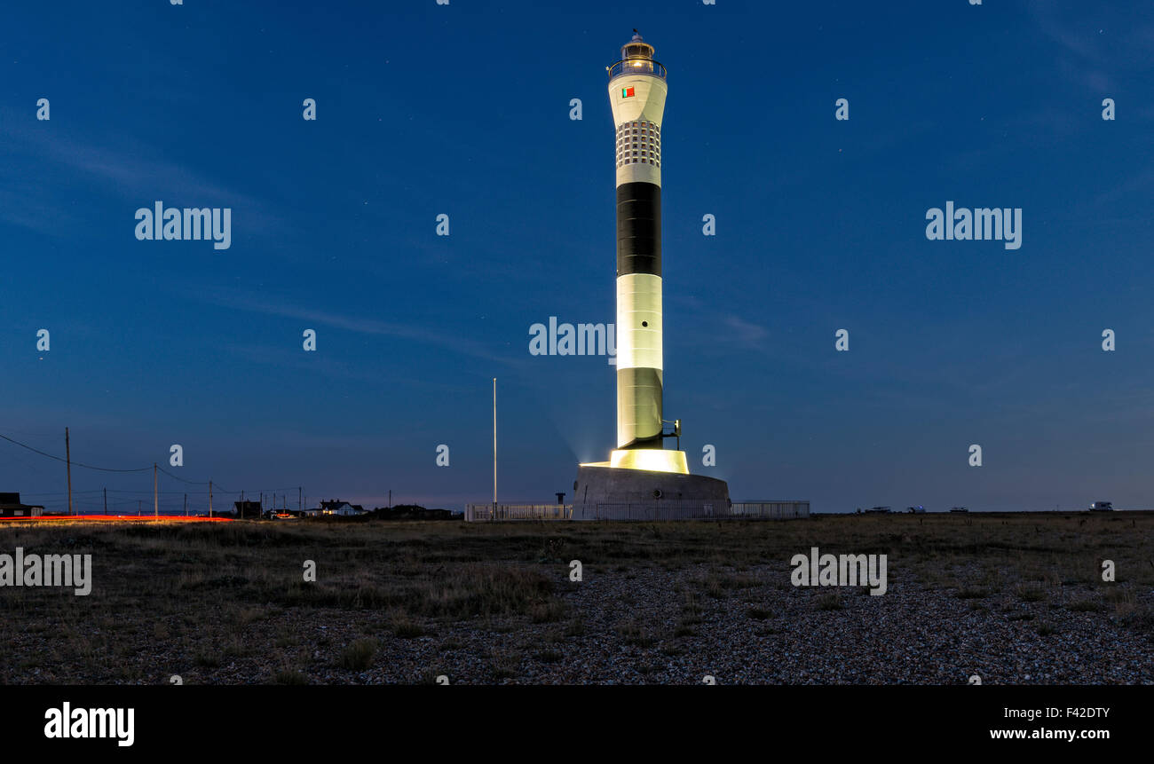 Lighthouse at night at Dungeness on the kent coast Stock Photo