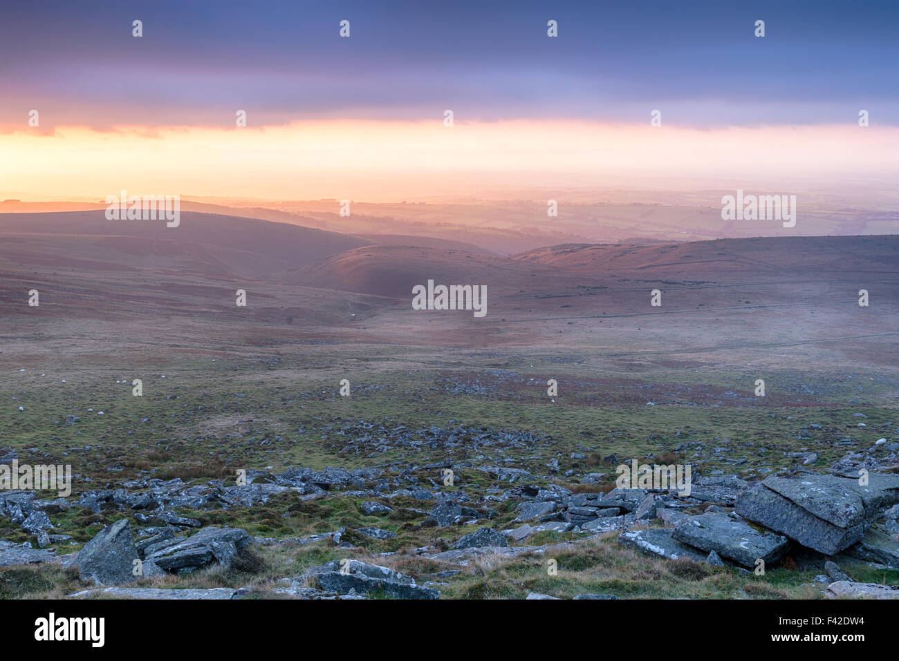 Rain clouds gathering at sunset from West Mill Tor near Okehampton on Dartmoor National Park in Devon Stock Photo