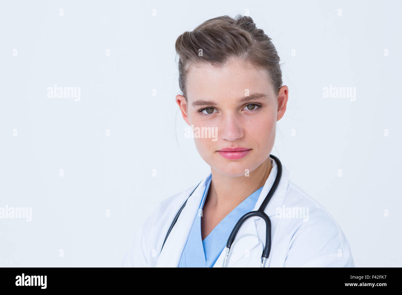 Smiling doctor looking at camera Stock Photo - Alamy