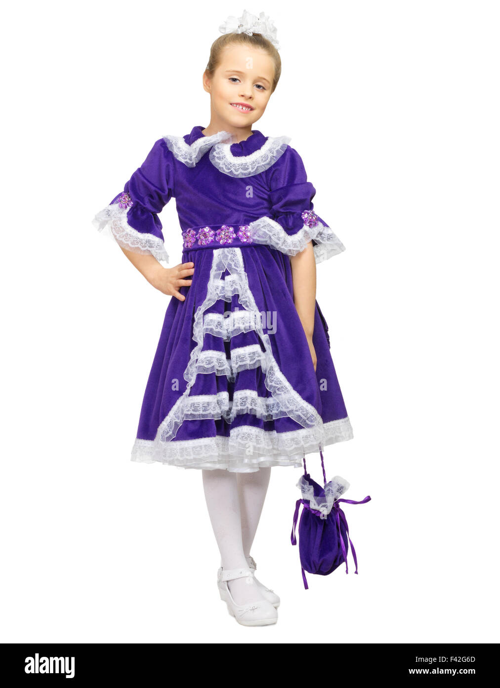 Little girl in blue dress isolated Stock Photo - Alamy