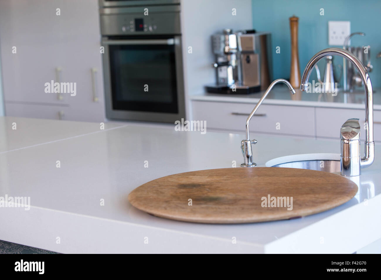 Empty kitchen with white cabinets Stock Photo - Alamy