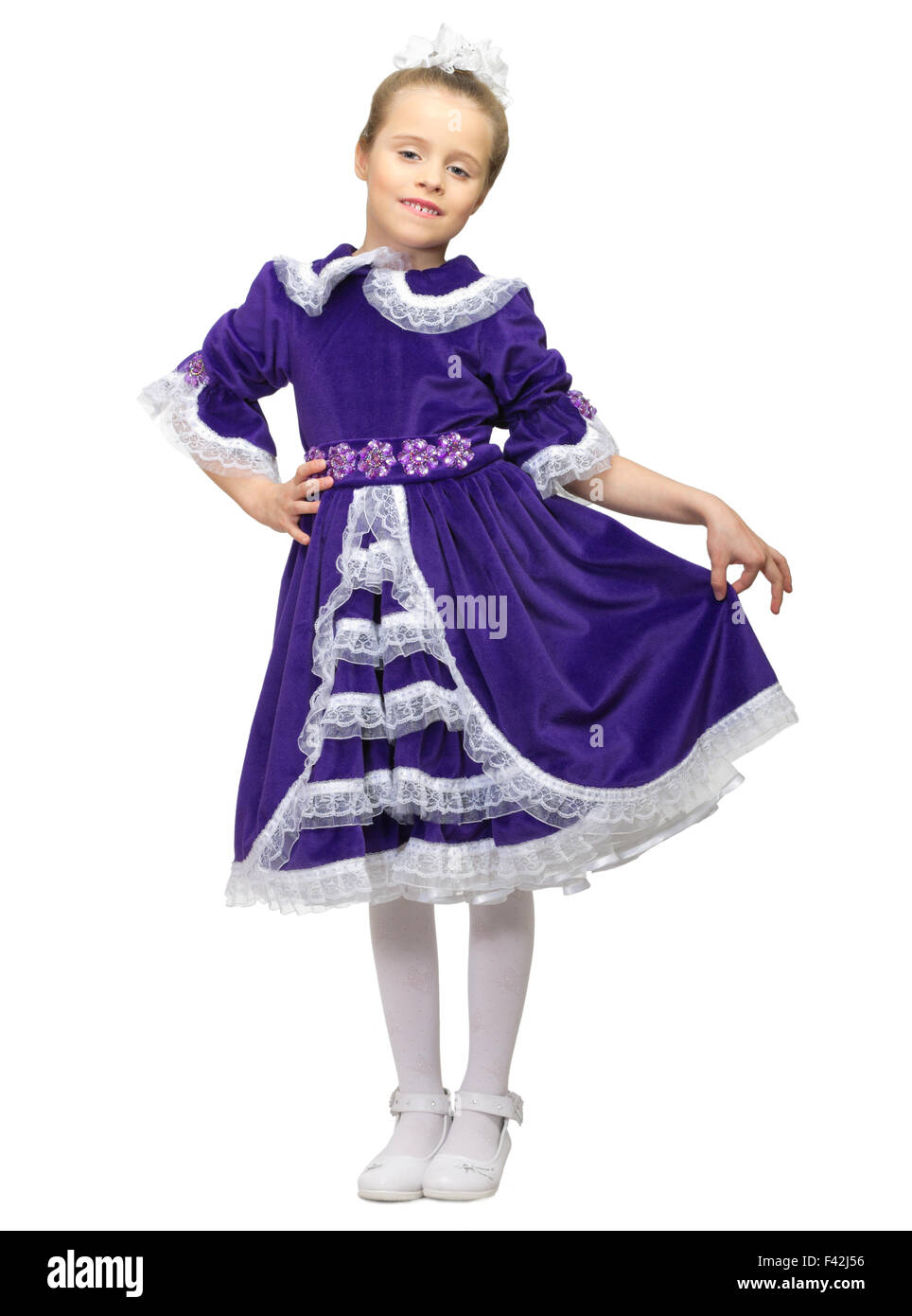 Little girl in blue dress isolated Stock Photo Alamy