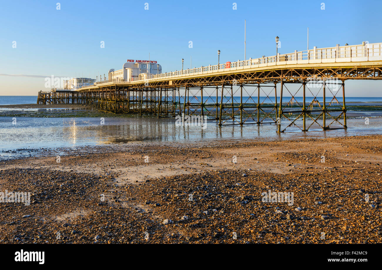 Worthing Pier at low tide in Worthing, West Sussex, England, UK. Stock Photo