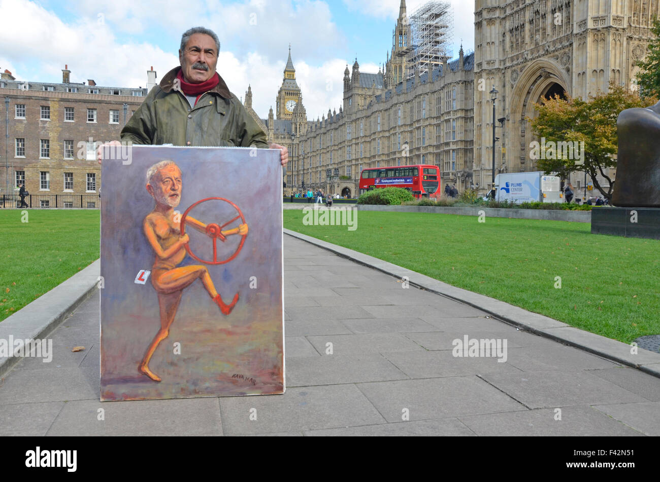 London, UK. 14th October, 2015. Satirical artist Kaya Mar outside the Houses of Parliament as the new Labour leader Jeremy Corbyn takes part in his second Prime Minister's Questions inside Credit:  PjrNews/Alamy Live News Stock Photo