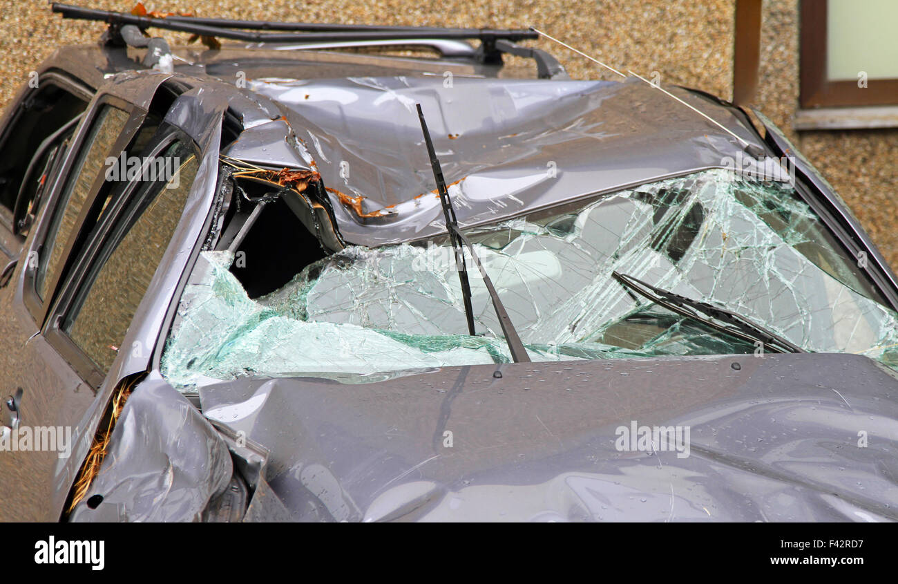 Unrecognizable SUV after roll over crush Stock Photo