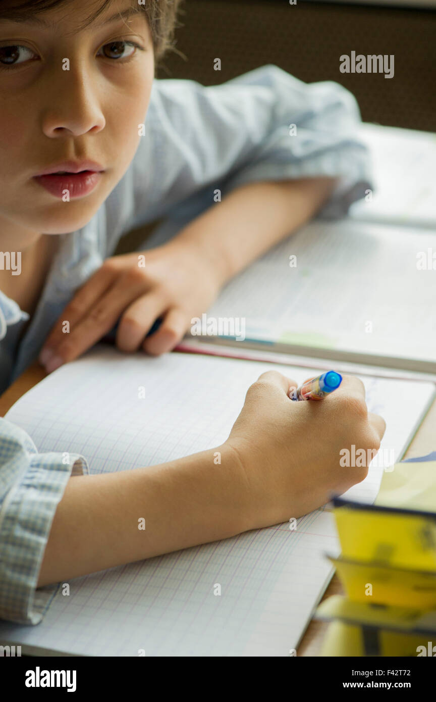 Teen boy distracting from online lesson and playing video games, scrolling  phone. Learning difficulties, online education, entertainment at home Stock  Photo - Alamy