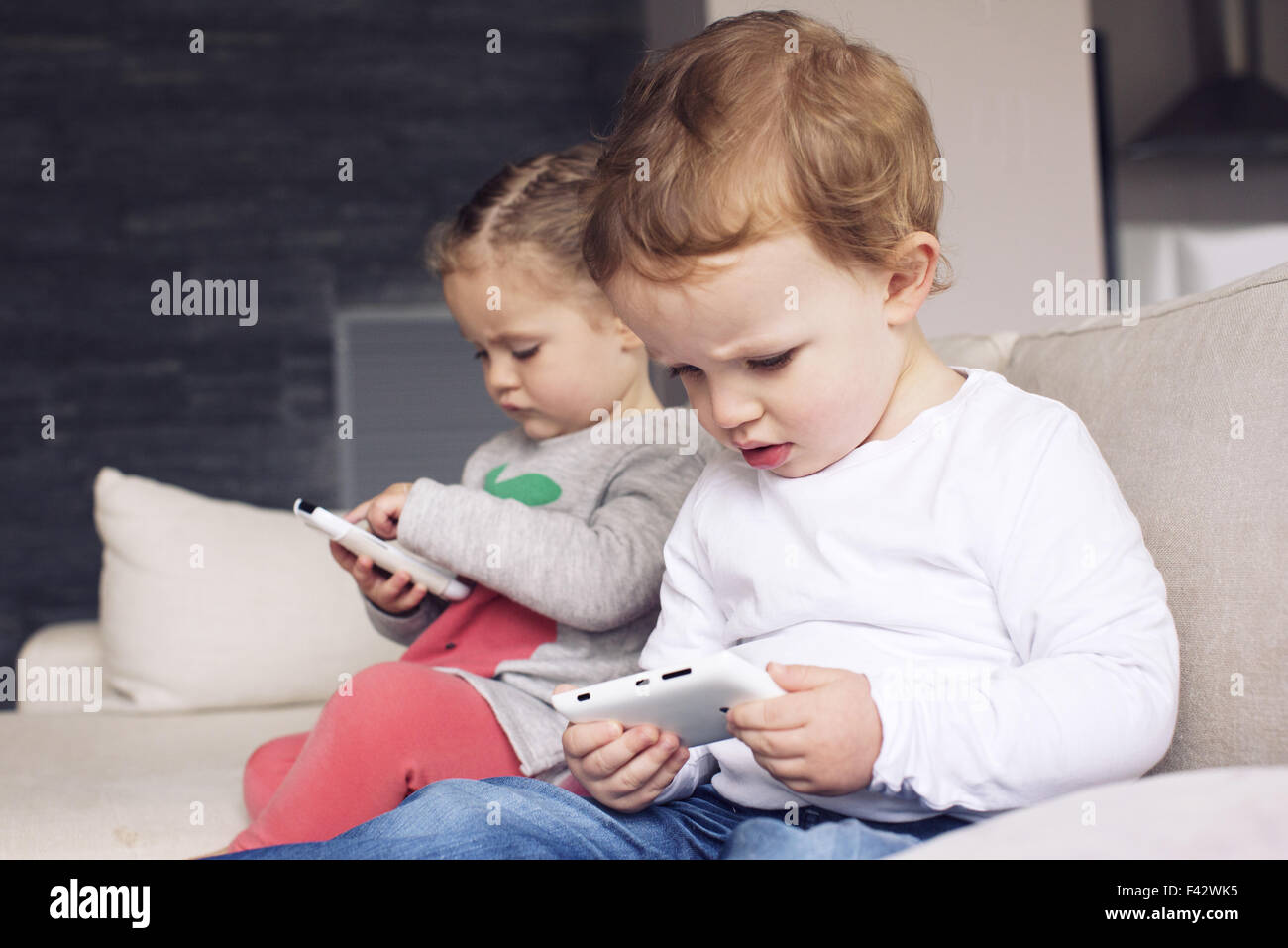 Children using smartphones Stock Photo