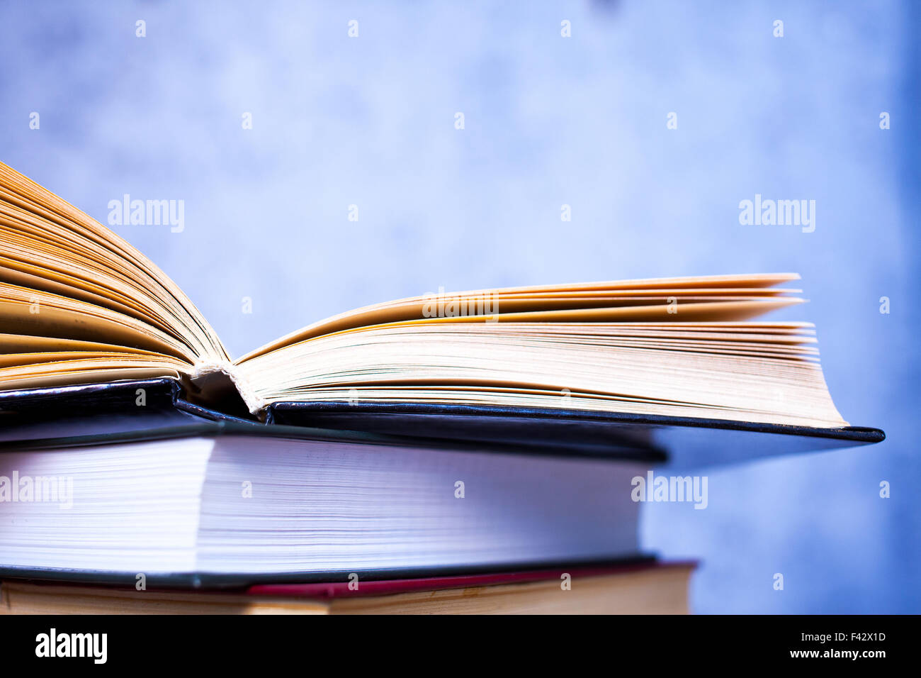Vintage books in stack Stock Photo Alamy