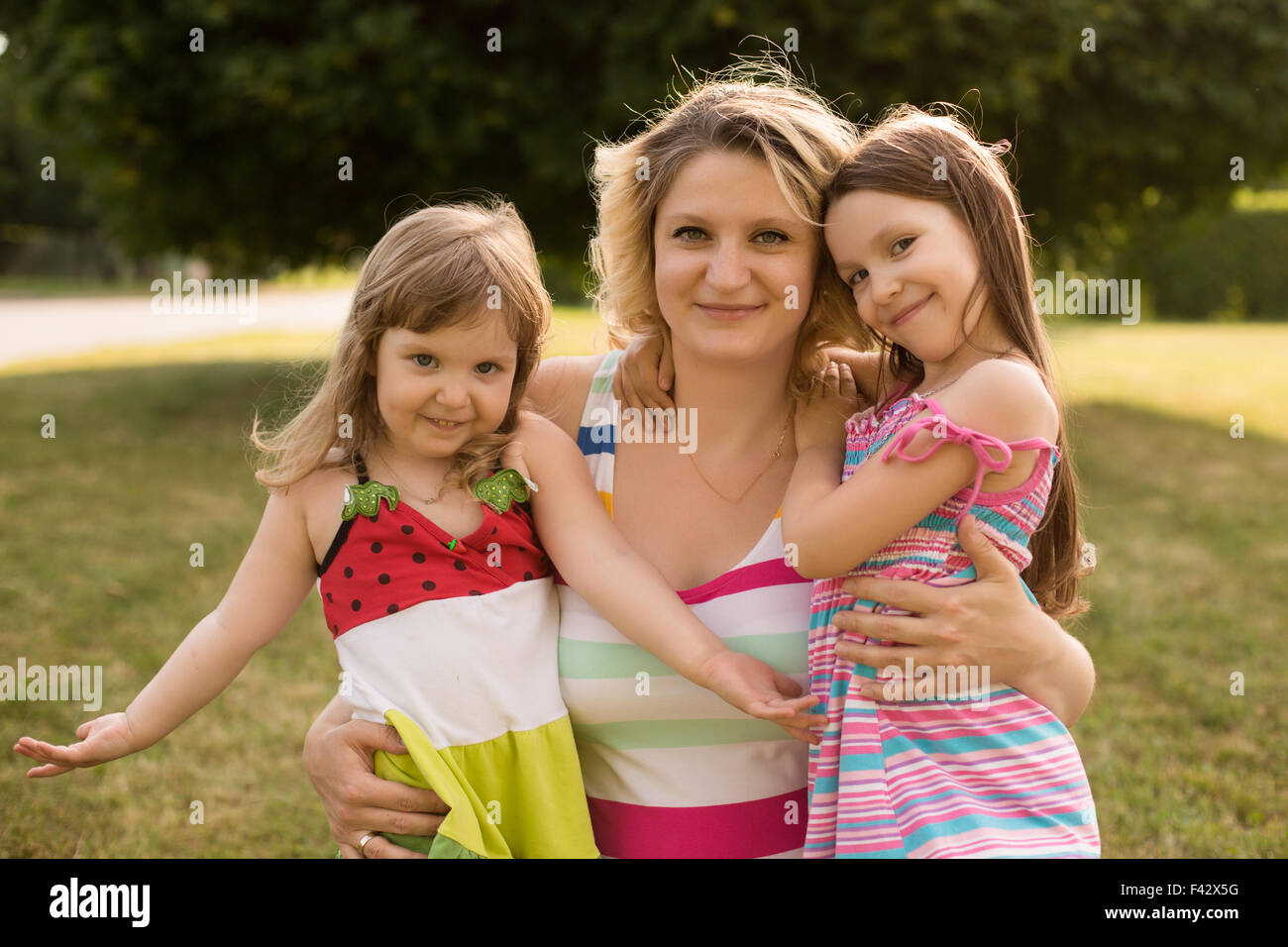Pregnant woman with her daughters Stock Photo