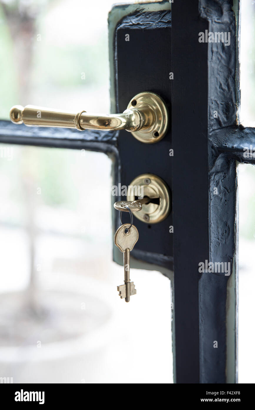 Key in door lock, close-up Stock Photo