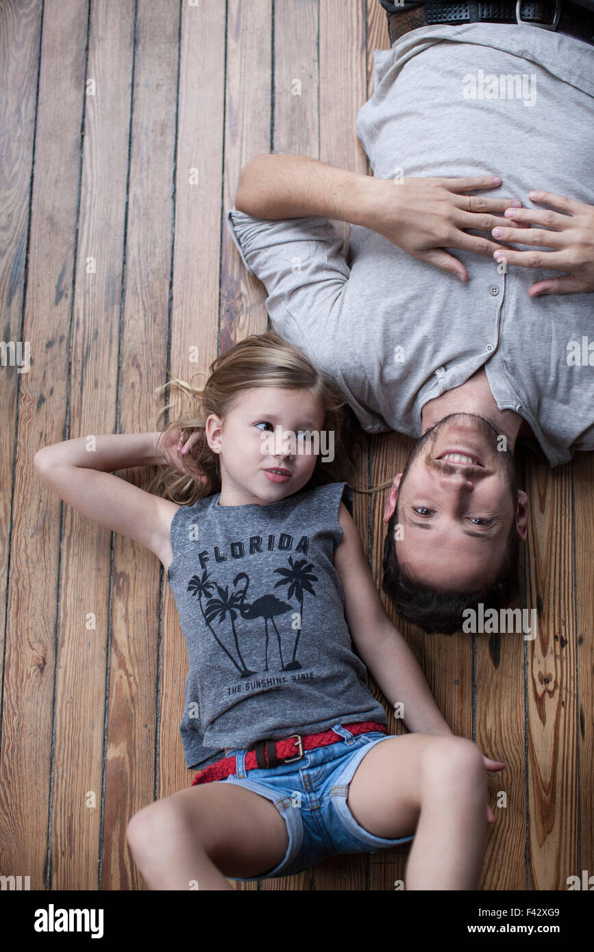Little girl and father hanging out together Stock Photo