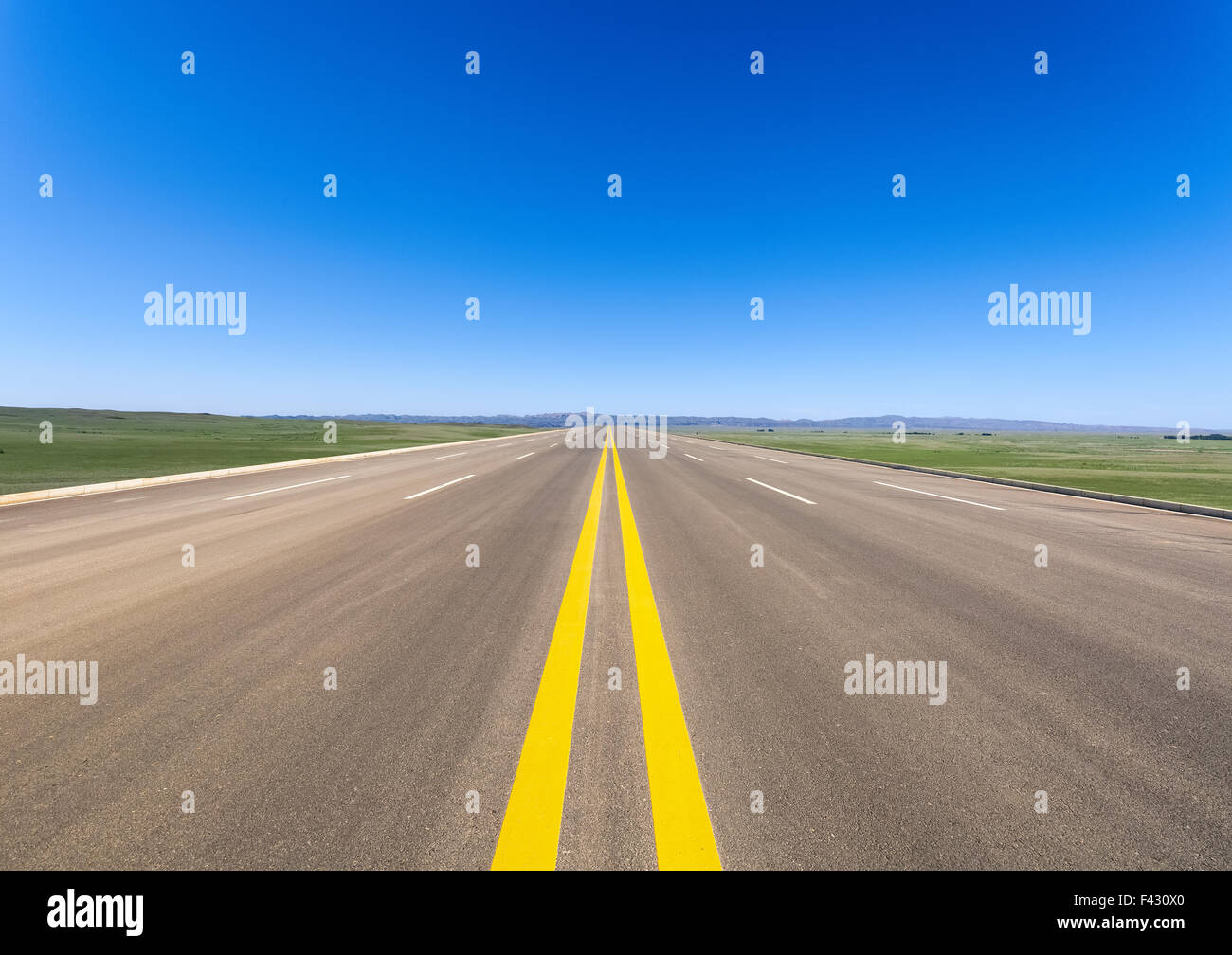 wide road in prairie Stock Photo