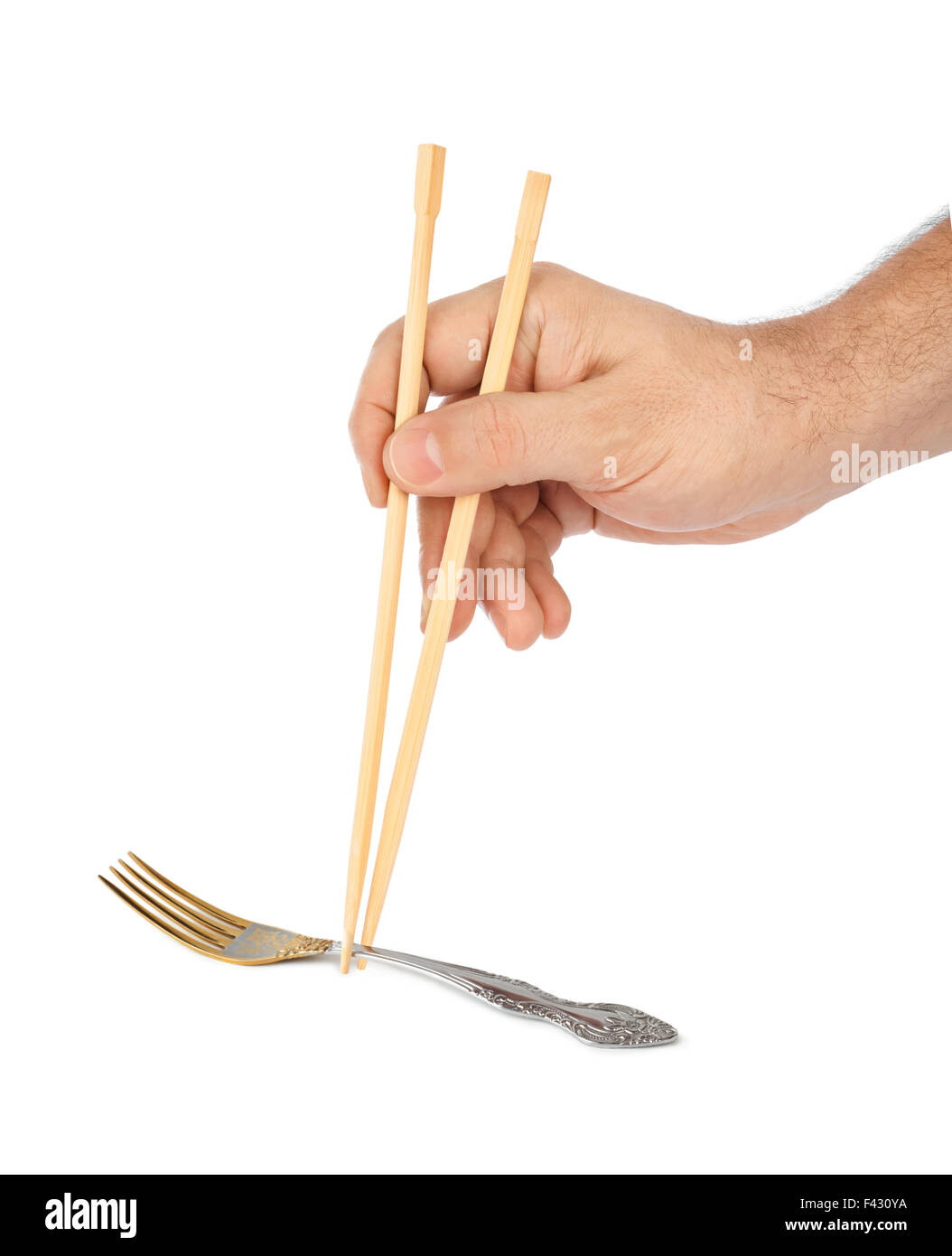 Hand with chopsticks and fork Stock Photo Alamy
