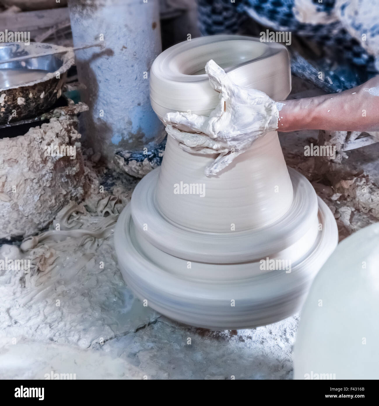 making of porcelain on wheel Stock Photo