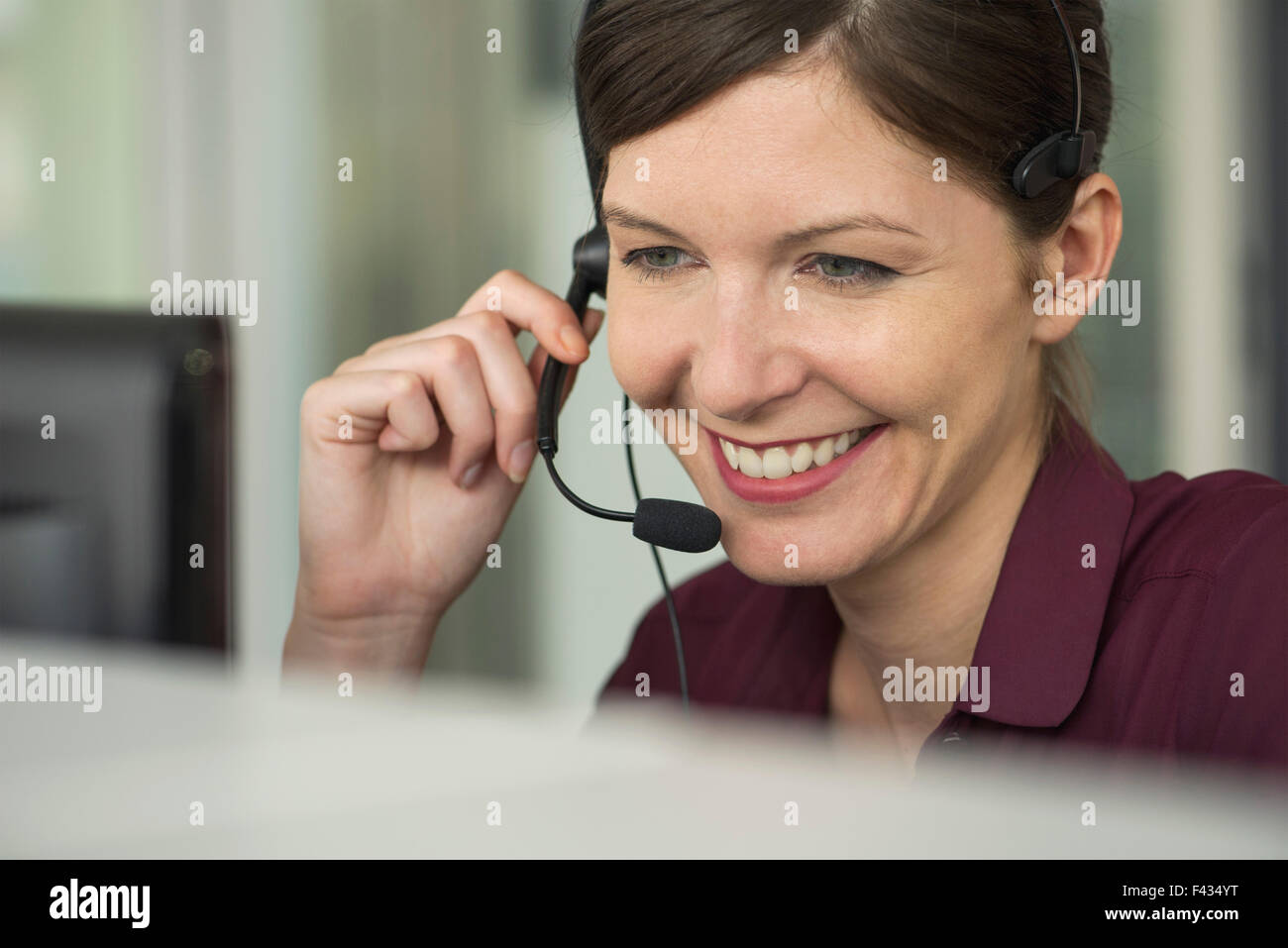 Receptionist at work, portrait Stock Photo Alamy