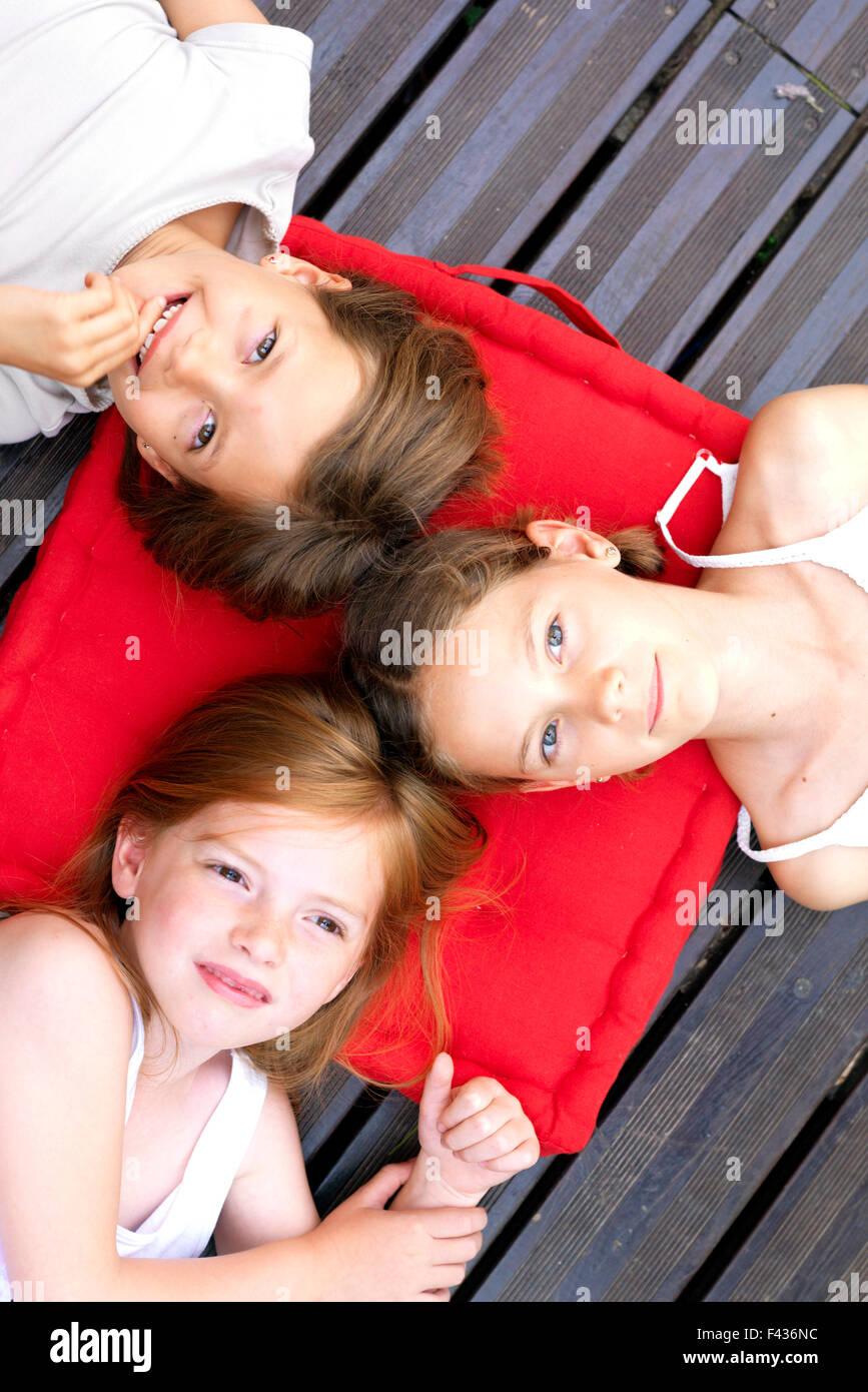 Preteen girl lying on back hi-res stock photography and images - Alamy