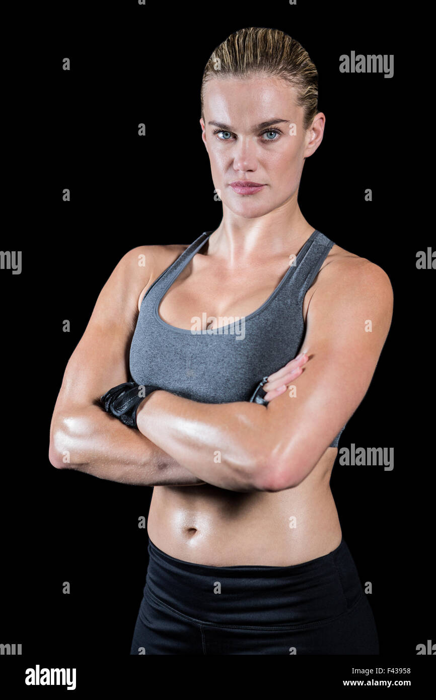 Muscular woman arms crossed hi-res stock photography and images - Alamy