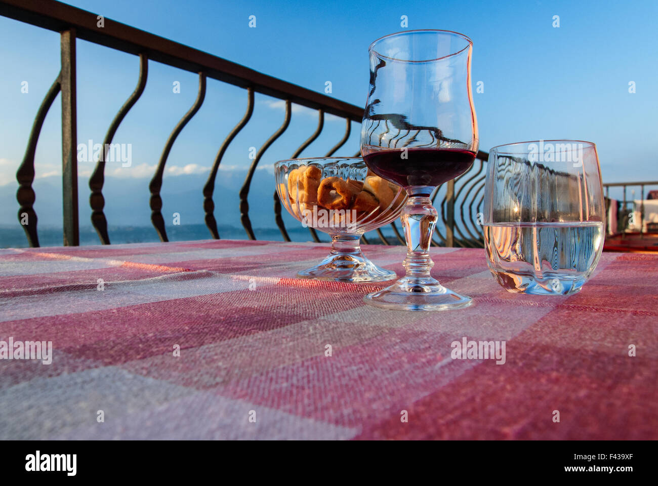 Glass of wine on the balcony Stock Photo Alamy