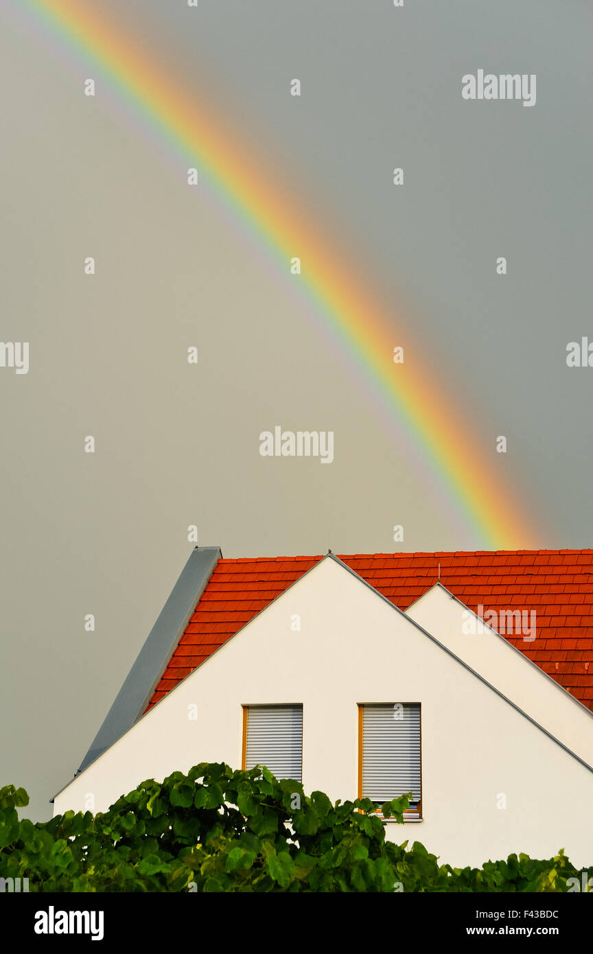 Rainbow over the house Stock Photo