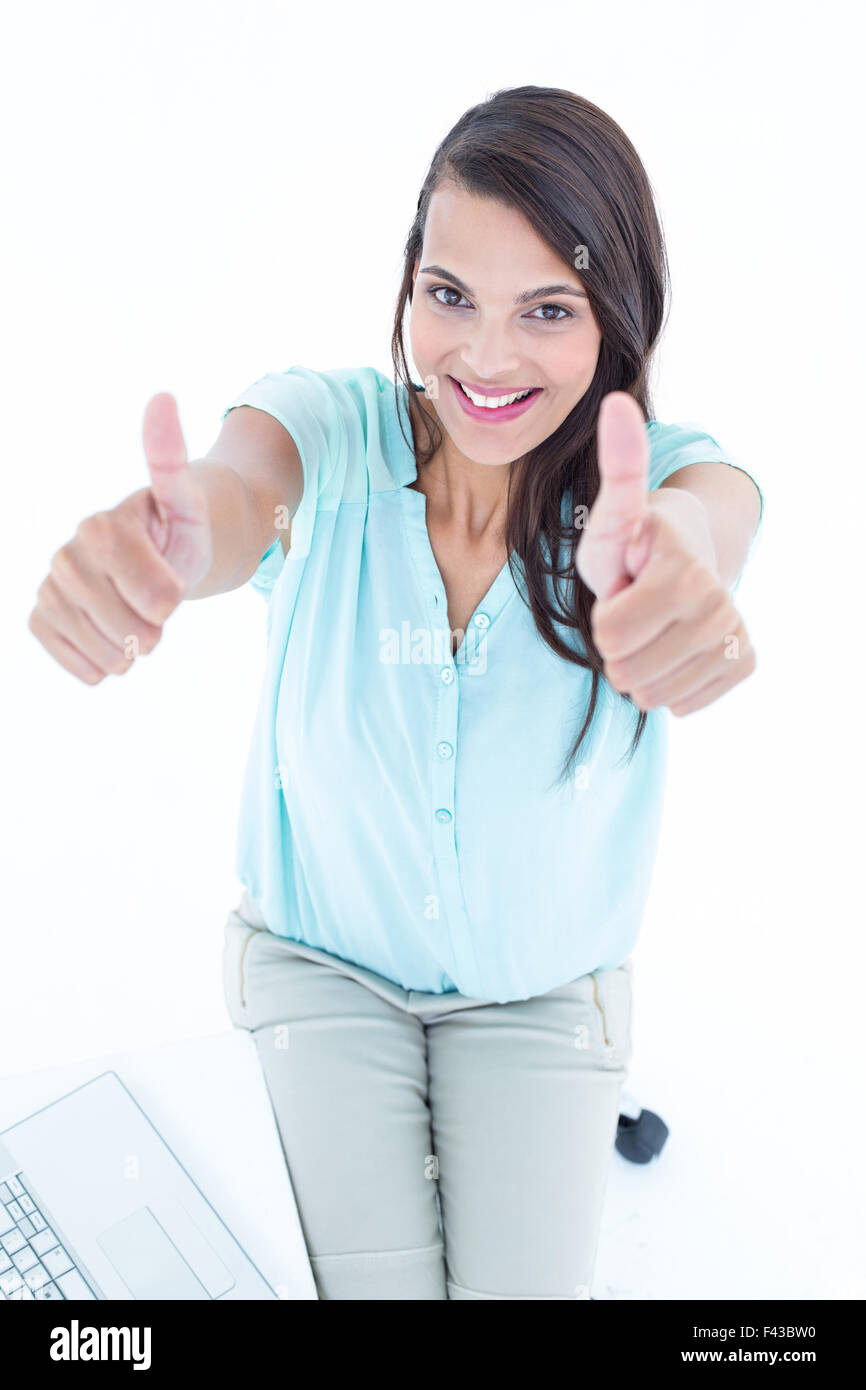 Woman showing thumb up using hi-res stock photography and images - Alamy