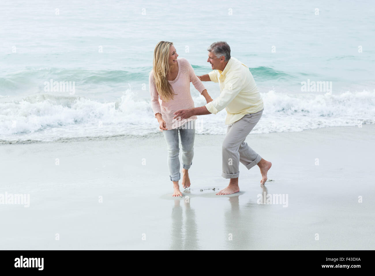 Happy couple having fun together Stock Photo - Alamy