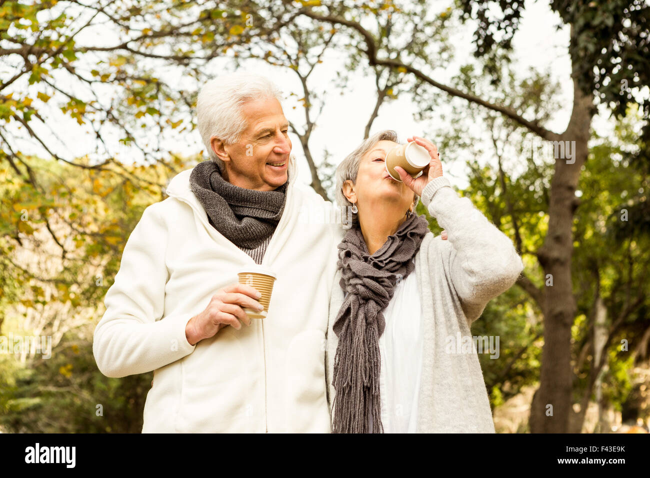 Senior couple in the park Stock Photo - Alamy