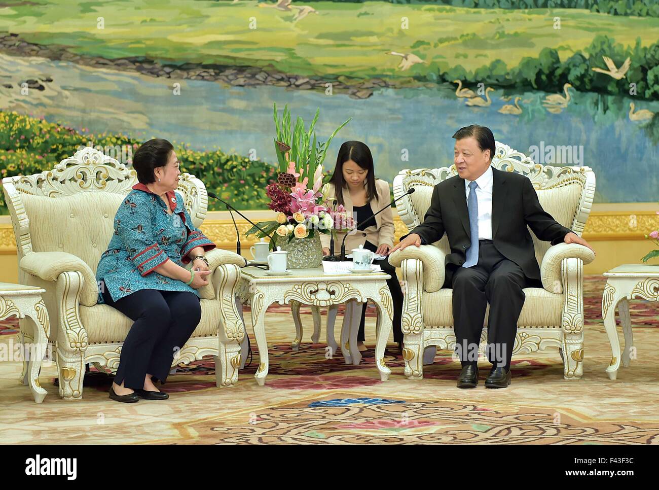 Beijing, China. 14th Oct, 2015. Liu Yunshan (R), a member of the Standing Committee of the Political Bureau of the Communist Party of China (CPC) Central Committee, meets with former Indonesian President Megawati Soekarnoputri in Beijing, capital of China, Oct. 14, 2015. © Li Tao/Xinhua/Alamy Live News Stock Photo
