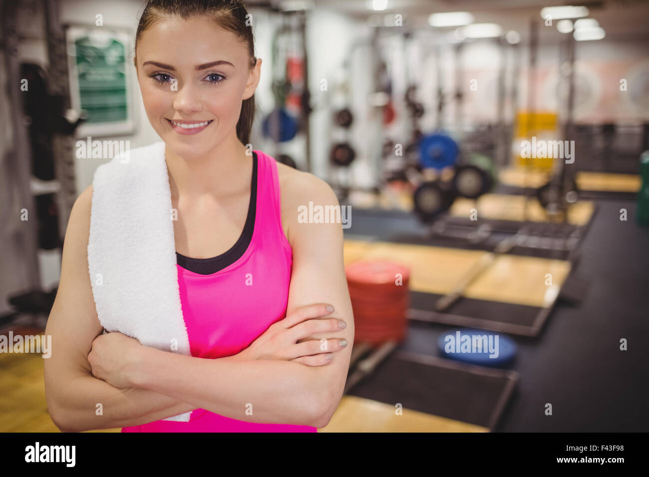 Fit woman smiling at camera Stock Photo - Alamy
