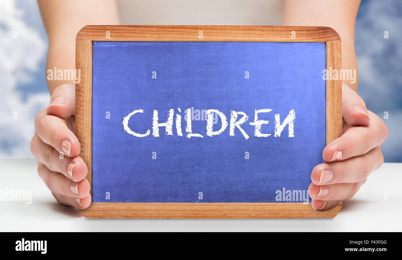 Children against bright blue sky with clouds Stock Photo - Alamy