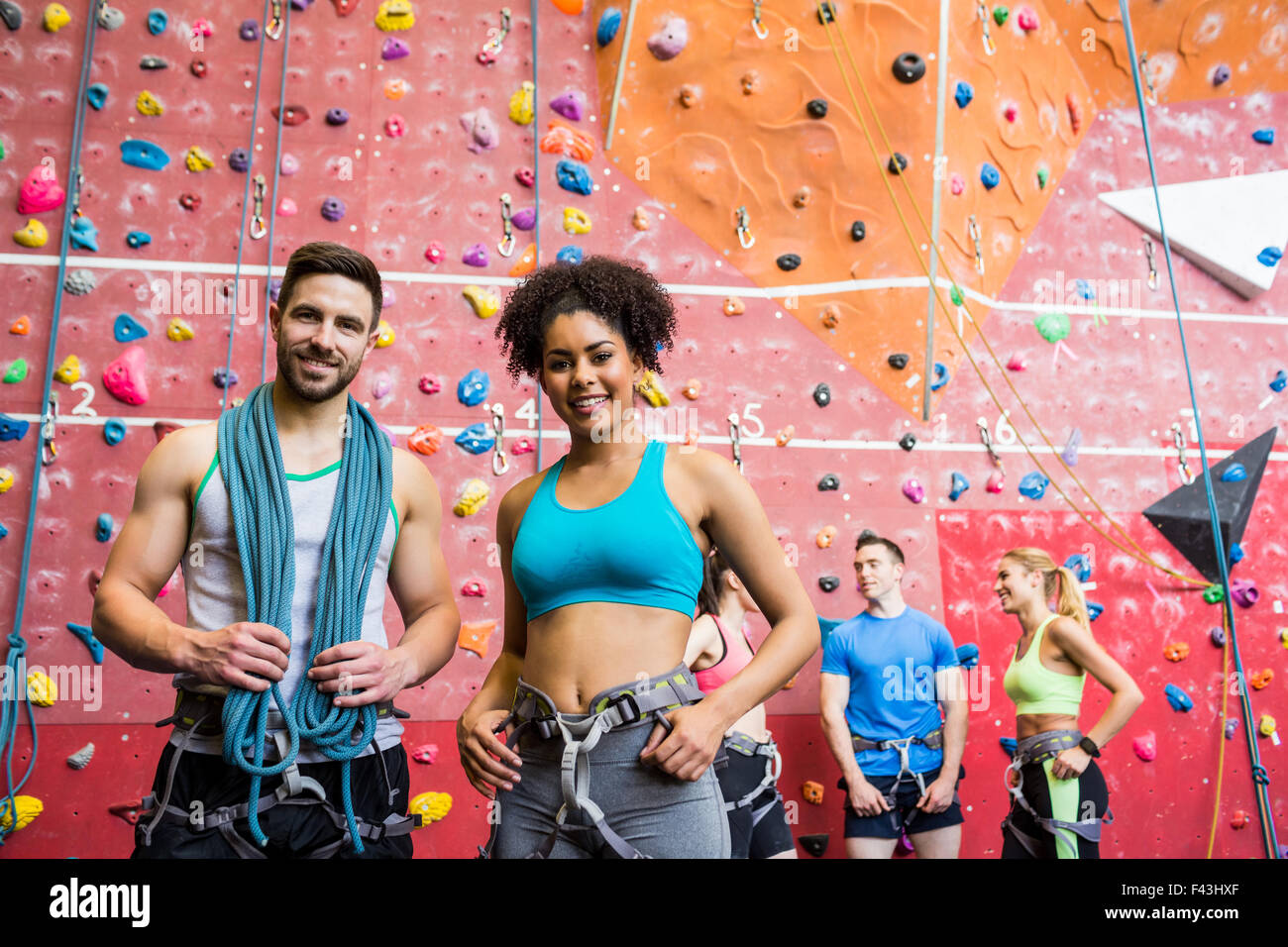 Fit people getting ready to rock climb Stock Photo Alamy