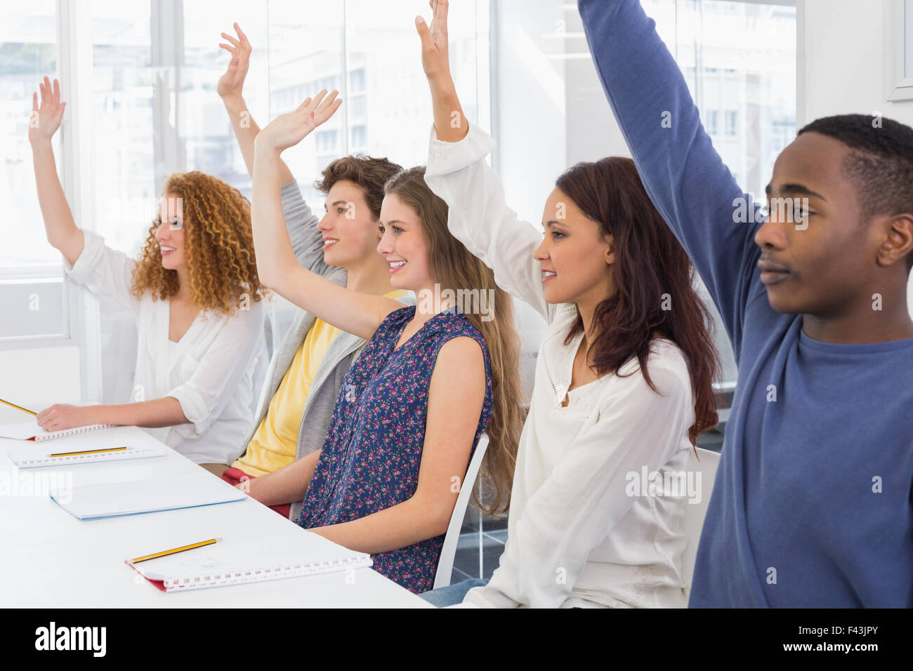 Fashion students being attentive in class Stock Photo - Alamy