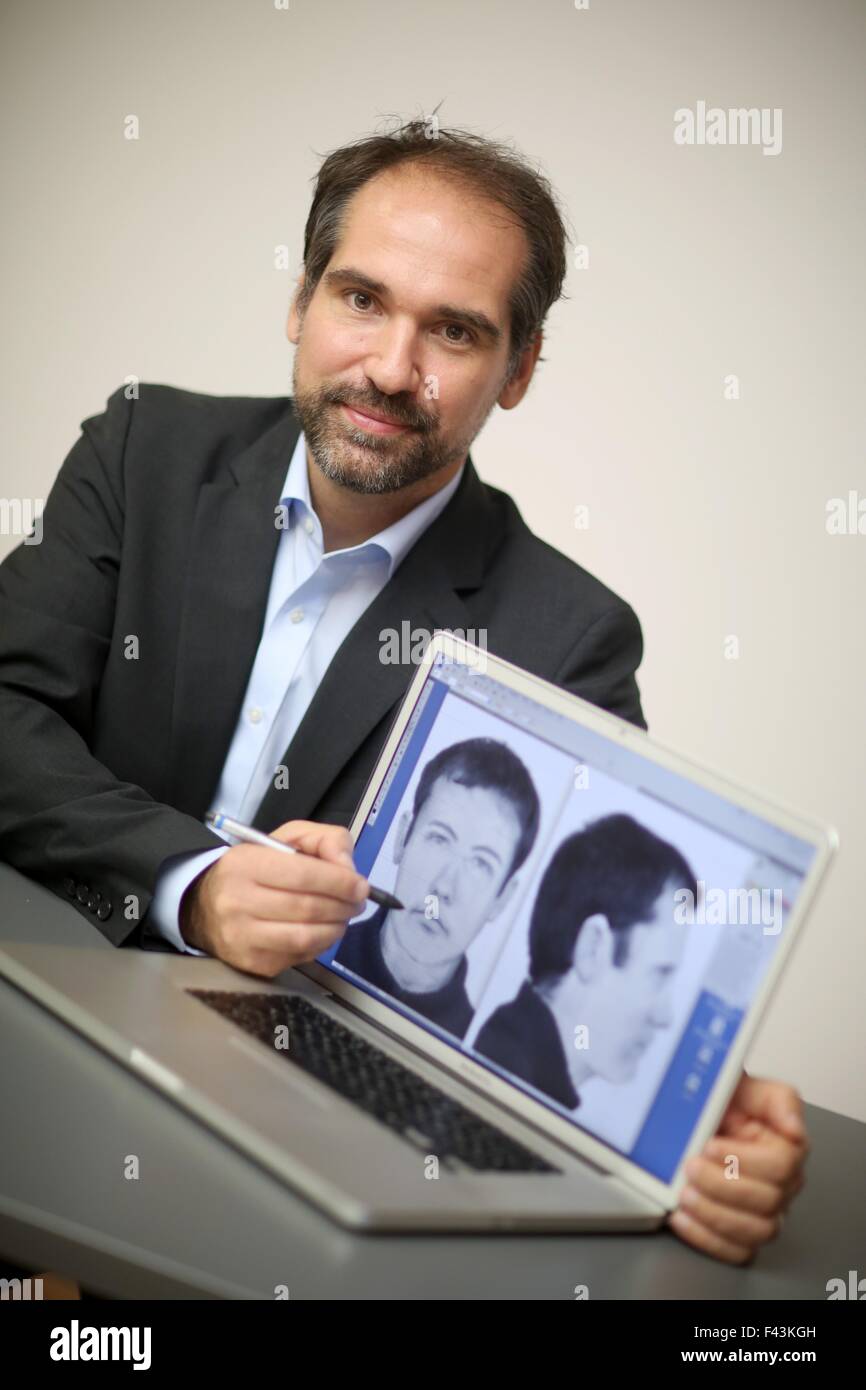 Mainz, Germany. 14th Oct, 2015. Policeman and identity-imagist Uwe Kinn shows off a sample ficticious criminal identity image at the State Criminal Office (LKA) in Mainz, Germany, 14 October 2015. The new method allows multiple perspectives to be considered at the same time to be implemented on a three-dimensional object. Photo: FREDERICK VON ERICHSEN/DPA/Alamy Live News Stock Photo