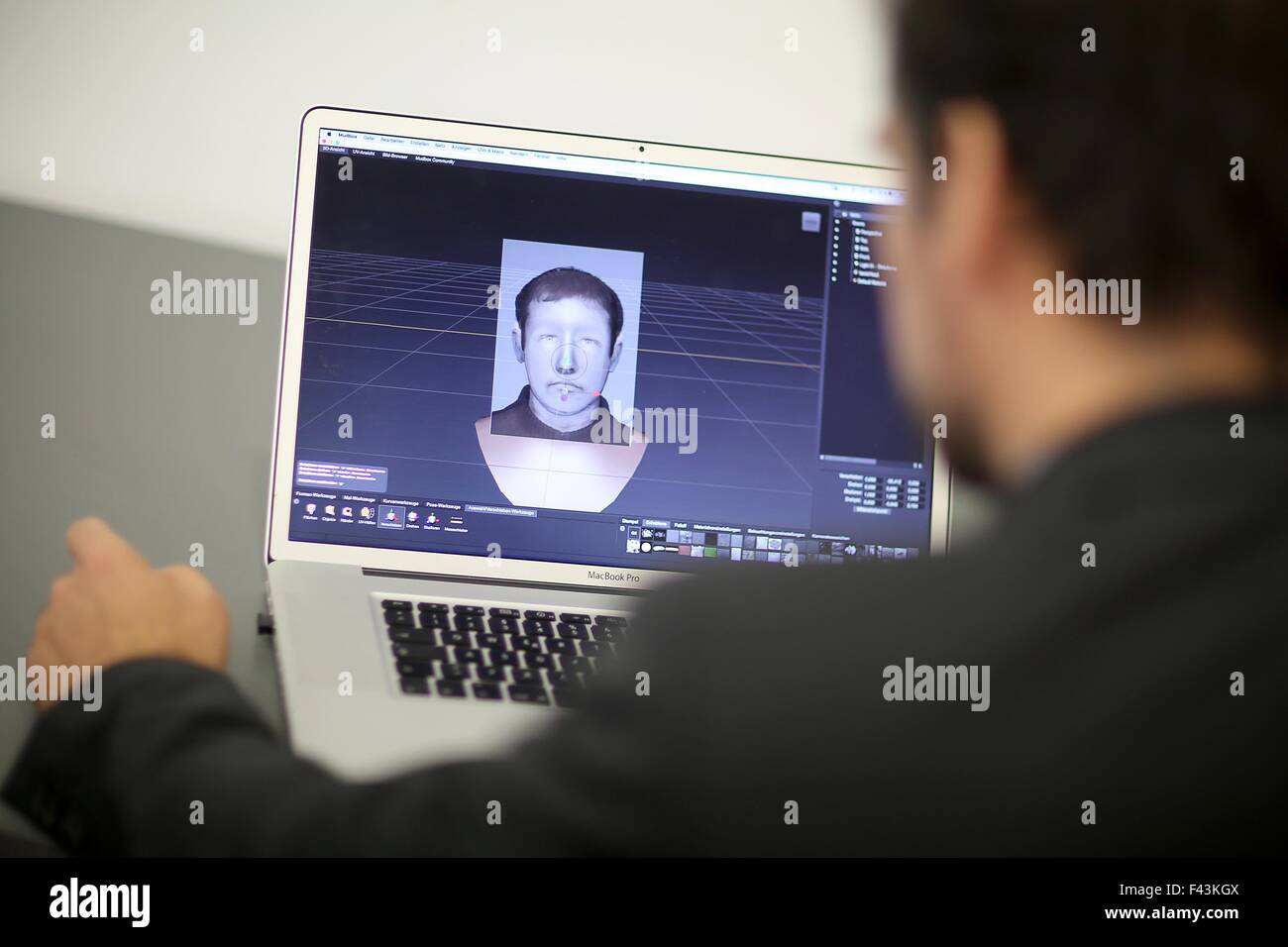 Mainz, Germany. 14th Oct, 2015. Policeman and identity-imagist Uwe Kinn shows off a sample ficticious criminal identity image at the State Criminal Office (LKA) in Mainz, Germany, 14 October 2015. The new method allows multiple perspectives to be considered at the same time to be implemented on a three-dimensional object. Photo: FREDERICK VON ERICHSEN/DPA/Alamy Live News Stock Photo
