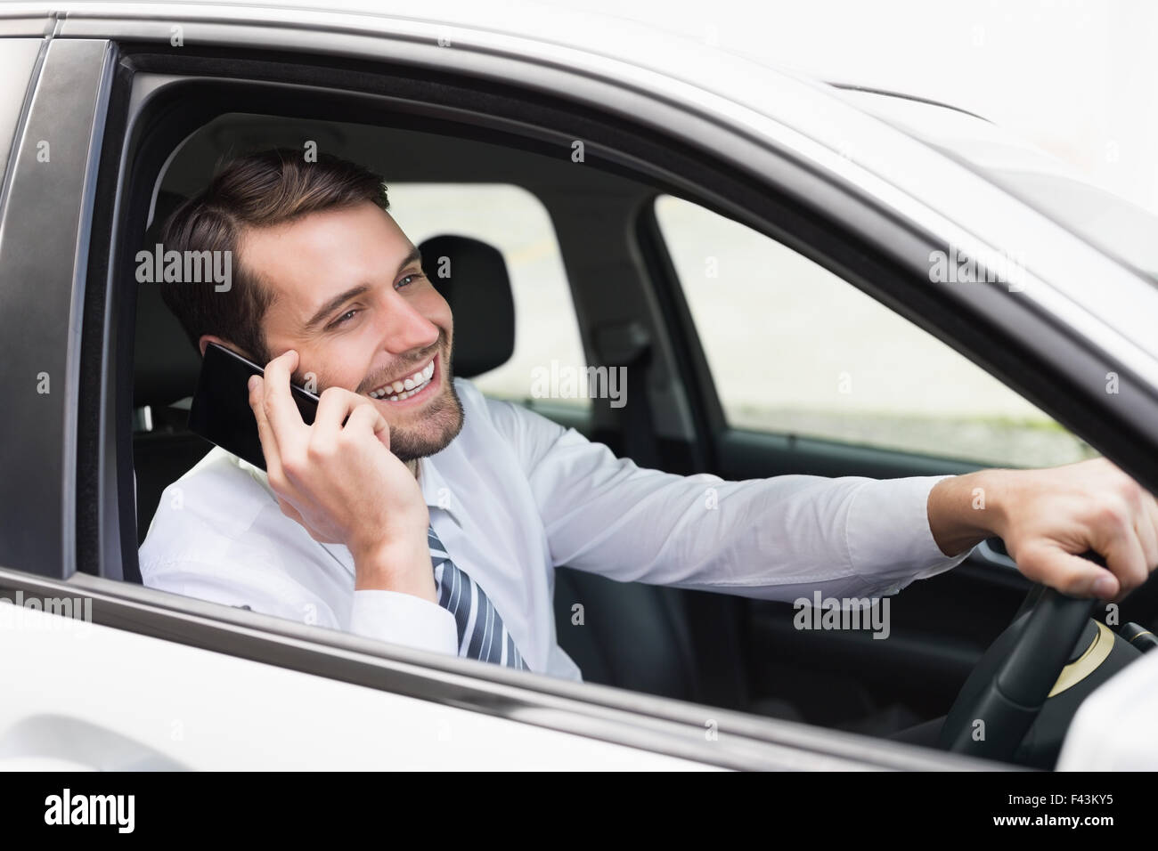 Man tie smiling car steering wheel hi-res stock photography and images ...