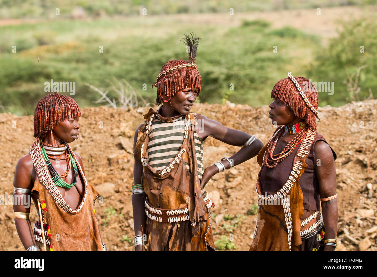 Hamer Women anxiously wait at the traditional whipping ritual. Omo Valley, Ethiopia Stock Photo