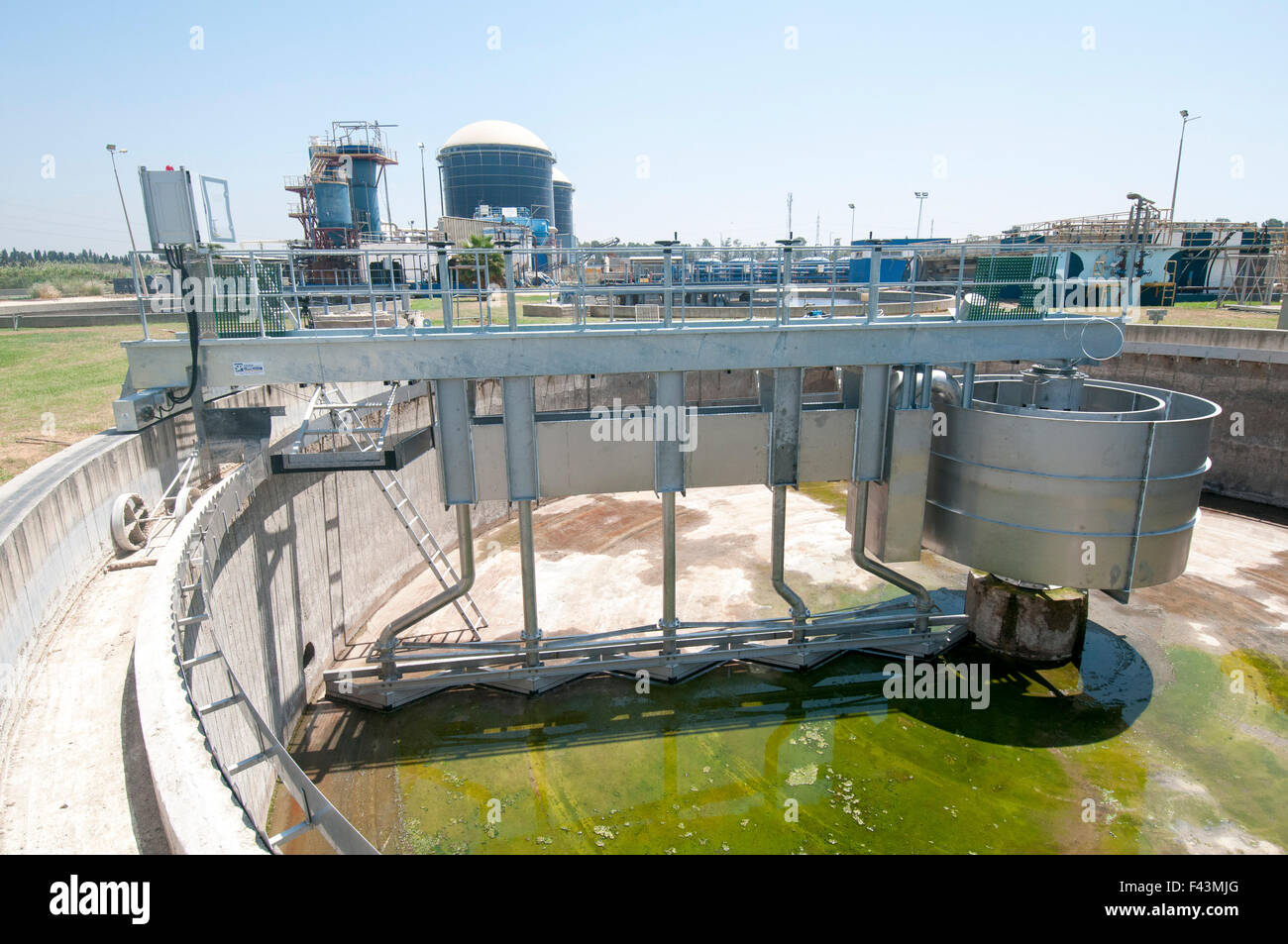 Empty Primary sedimentation pool at a Sewerage treatment facility. The treated water is then used for irrigation and agricultura Stock Photo