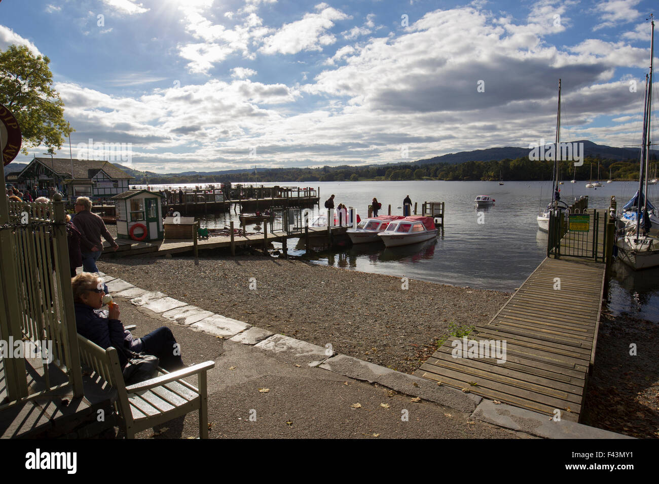 Lake Windermere Cumbria UK Wednesday  14th October 2015,  Sunny  afternoon  at Waterhead at the northern end of Lake Windermere .Showing autumnal colours  Afresco teas & ice cream at lakeside cafe  Credit:  Gordon Shoosmith/Alamy Live News Stock Photo